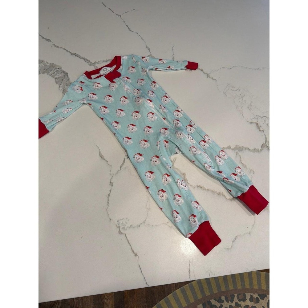 Proper Peony Pima one-piece zipper pajama in the "Jolly Santa" pattern 12 months